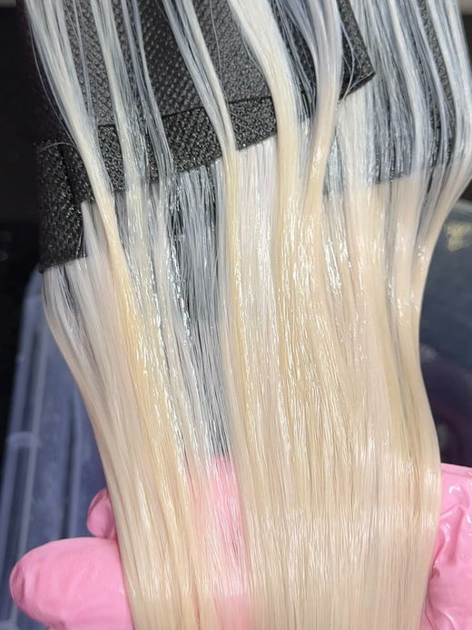 Finished blonde 613 hair weft after industrial bleaching and toning
