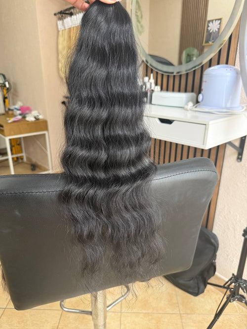 45 cm (18 inch) premium raw Slavic wavy hair extension, cold-bleached black color, single donor