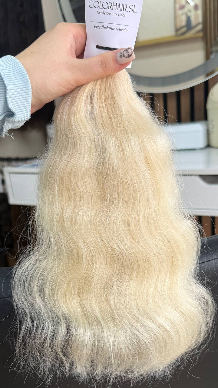 35 cm (14 inch) premium raw Slavic wavy hair extension, cold-bleached blonde color, single donor