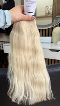 40 cm (16 inch) premium raw Slavic wavy hair extension, cold-bleached blonde color, single donor