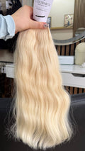 45 cm (18 inch) premium raw Slavic wavy hair extension, cold-bleached Blonde color, single donor