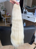 50 cm (20 inch) premium raw Slavic wavy hair extension, cold-bleached blonde color, single donor