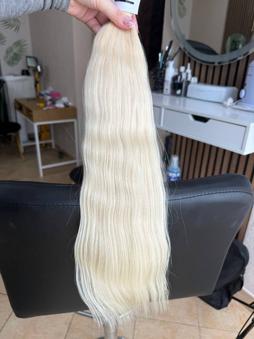 50 cm (20 inch) premium raw Slavic wavy hair extension, cold-bleached blonde color, single donor