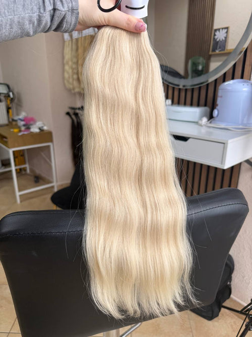 50 cm (20 inch) premium raw Slavic wavy hair extension, cold-bleached blonde color, single donor