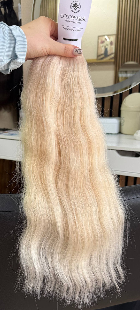 50 cm (20 inch) premium raw Slavic wavy hair extension, cold-bleached blonde color, single donor