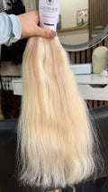 50 cm (20 inch) premium raw Slavic wavy hair extension, cold-bleached blonde color, single donor