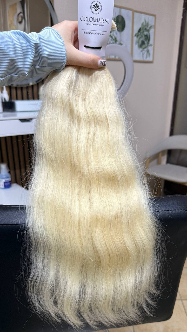 50 cm (20 inch) premium raw Slavic wavy hair extension, cold-bleached blonde color, single donor