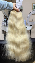 50 cm (20 inch) premium raw Slavic wavy hair extension, cold-bleached blonde color, single donor