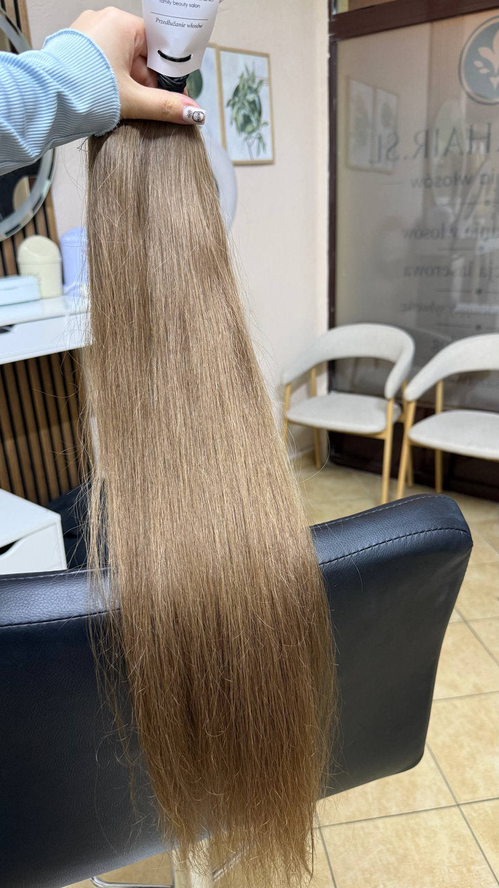 70 cm (28 inch) premium raw Slavic wavy hair extension, cold-bleached straight color, single donor