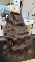 45 cm (18 inch) premium raw Slavic wavy hair extension, cold-bleached brown color, single donor