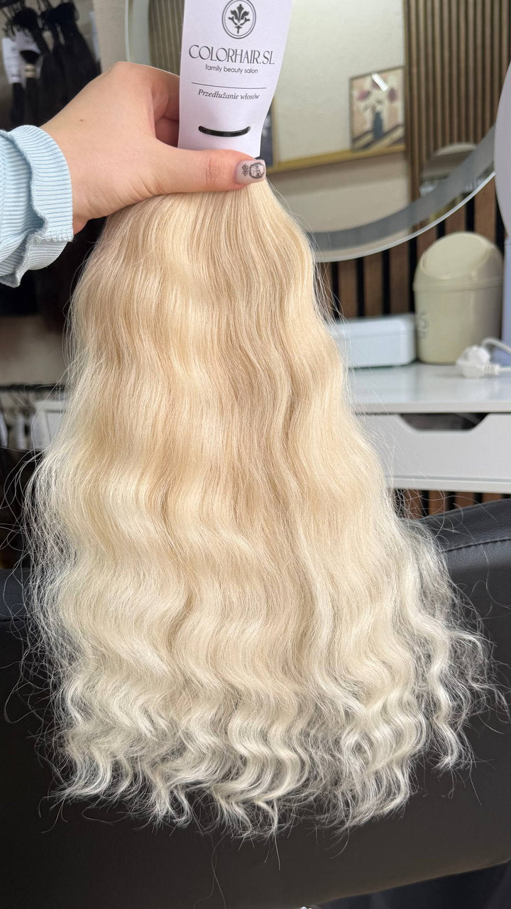 40 cm (16 inch) premium raw Slavic wavy hair extension, cold-bleached Honey Blonde color, single donor