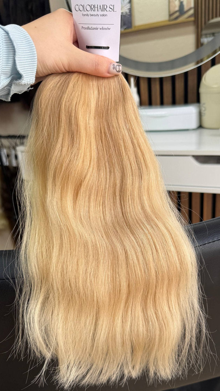 40 cm (16 inch) premium raw Slavic wavy hair extension, cold-bleached Honey Blonde color, single donor