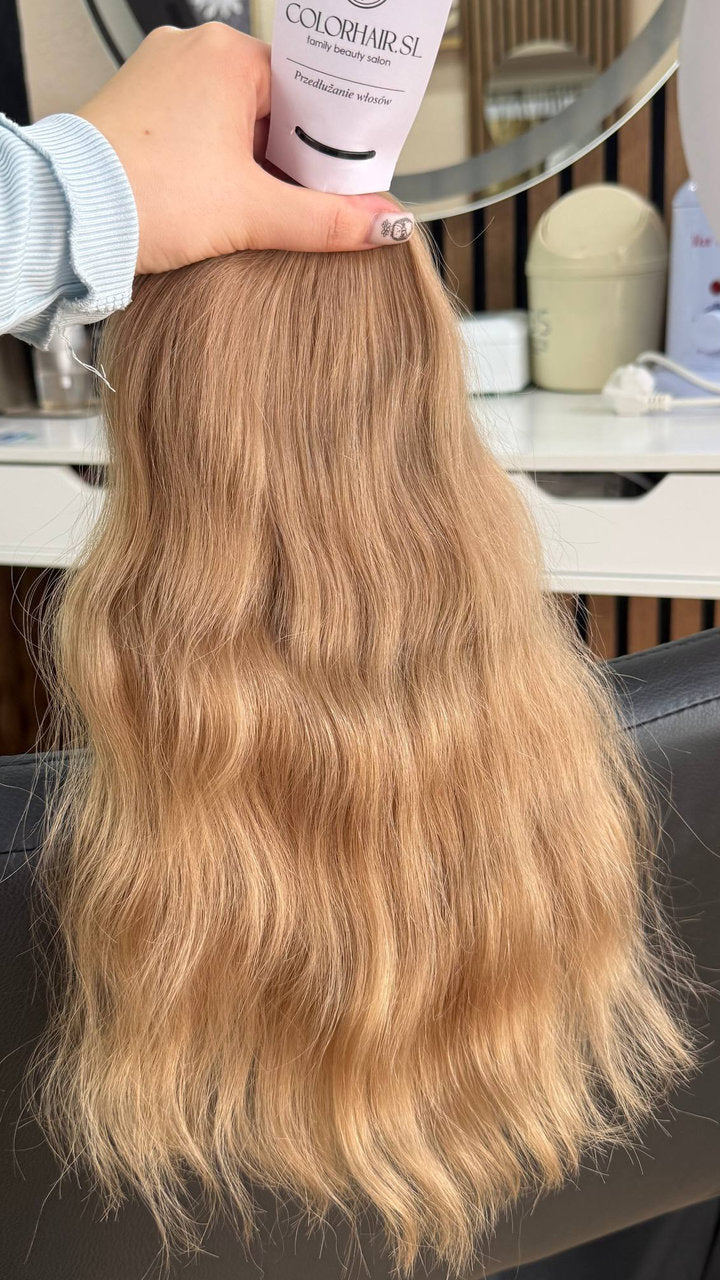 40 cm (16 inch) premium raw Slavic wavy hair extension, cold-bleached Honey Blonde color, single donor