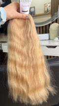 45 cm (18 inch) premium raw Slavic wavy hair extension, cold-bleached Honey Blonde color, single donor