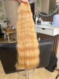 55 cm (22 inch) premium raw Slavic wavy hair extension, cold-bleached Honey Blonde color, single donor